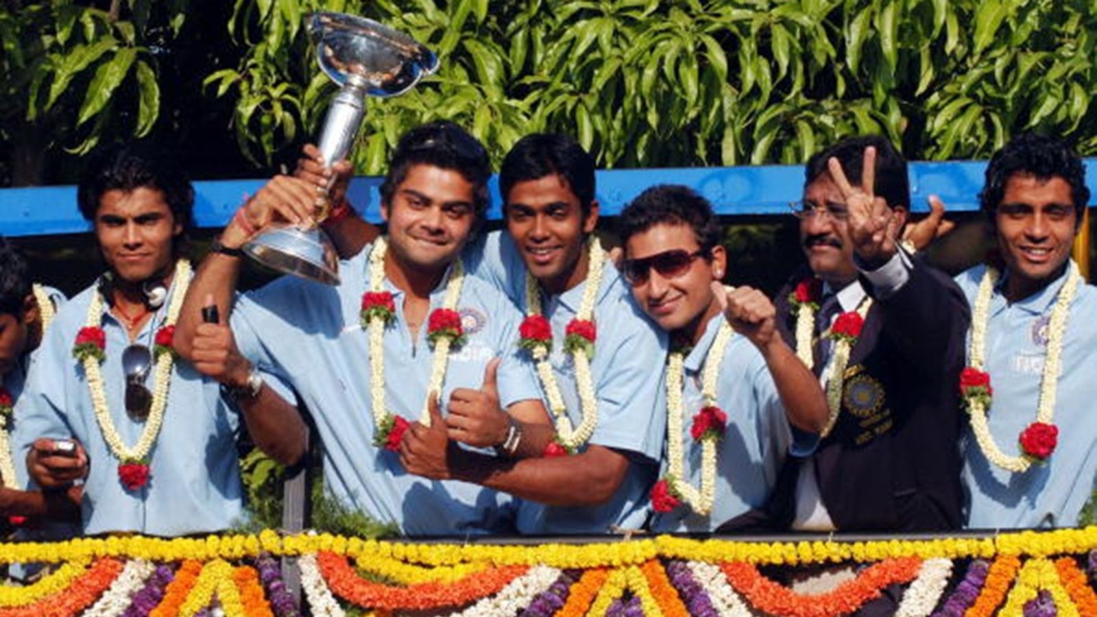 Former Punjab Kings batter and Virat Kohli's Under-19 2008 World Cup-winning teammate set to be umpire in IPL 2025 Under-19 World Cup winning Indian Cricket Team Captain Virat Kohli (2L) holds up the trophy upon arrival with his team at the Bangalore airport in Bangalore on March 4, 2008.