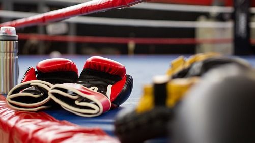 Big News: IOC gives green signal for inclusion of Boxing in Los Angeles Olympic Games 2028 Boxing gloves on boxing ring
