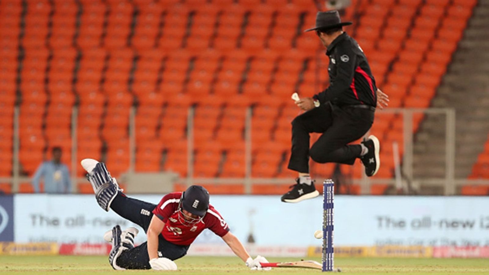 Veteran umpire who officiated in 483 games announces retirement from IPL and international cricket, says 'For the last six months, I've been behind...' Jonny Bairstow of England dives to make his ground as umpire Anil Chaudhary takes evasive action during the 3rd T20 between India and England at Narendra Modi Stadium on March 16, 2021 in Ahmedabad, India.