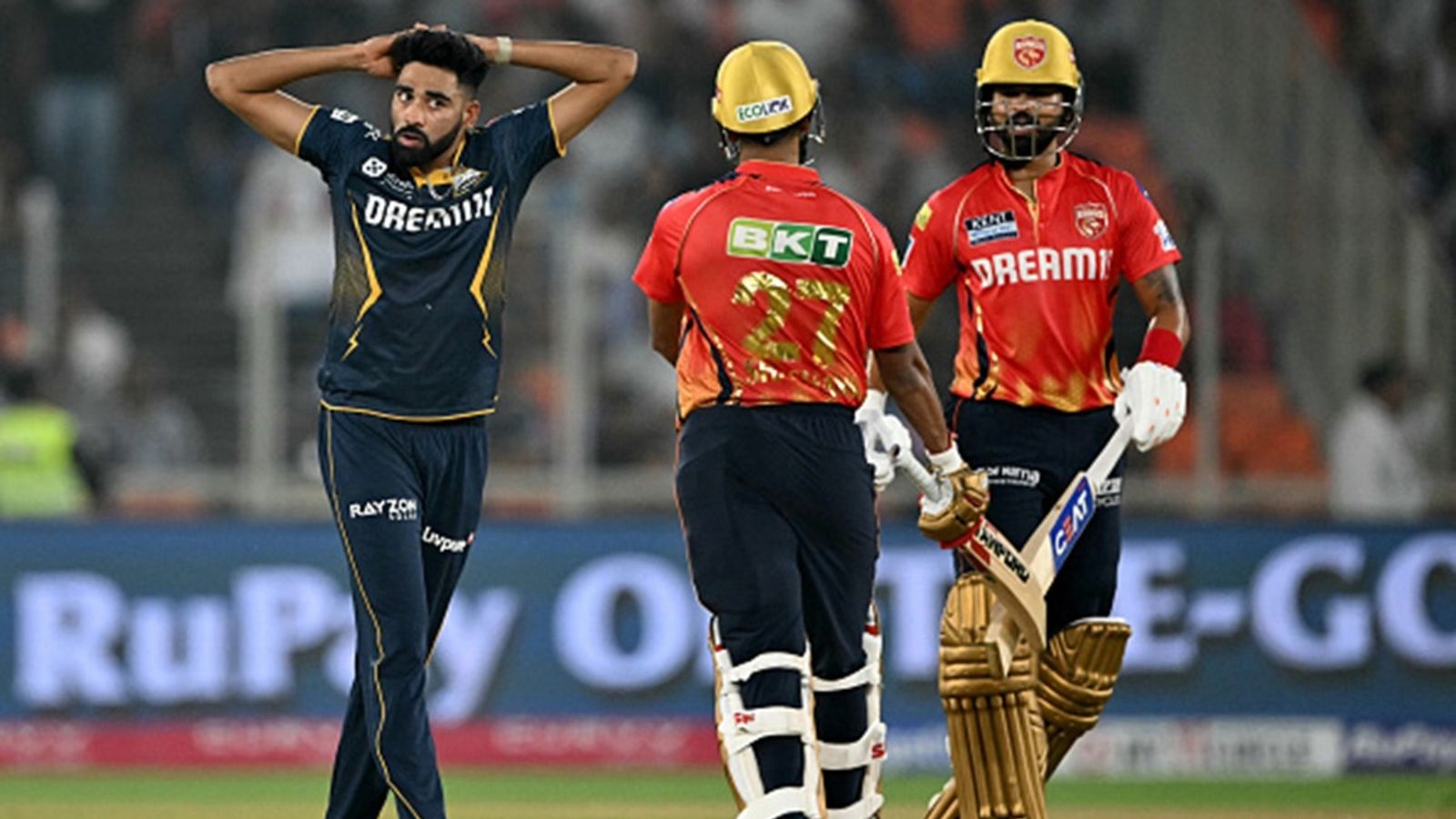 'His decision-making towards the end was not the best': Gujarat Titans' IPL 2022-winner on Mohammed Siraj's expensive spell against Punjab Kings Gujarat Titans' Mohammed Siraj (L) reacts during the Indian Premier League (IPL) match against Punjab Kings at the Narendra Modi Stadium in Ahmedabad on March 25, 2025.