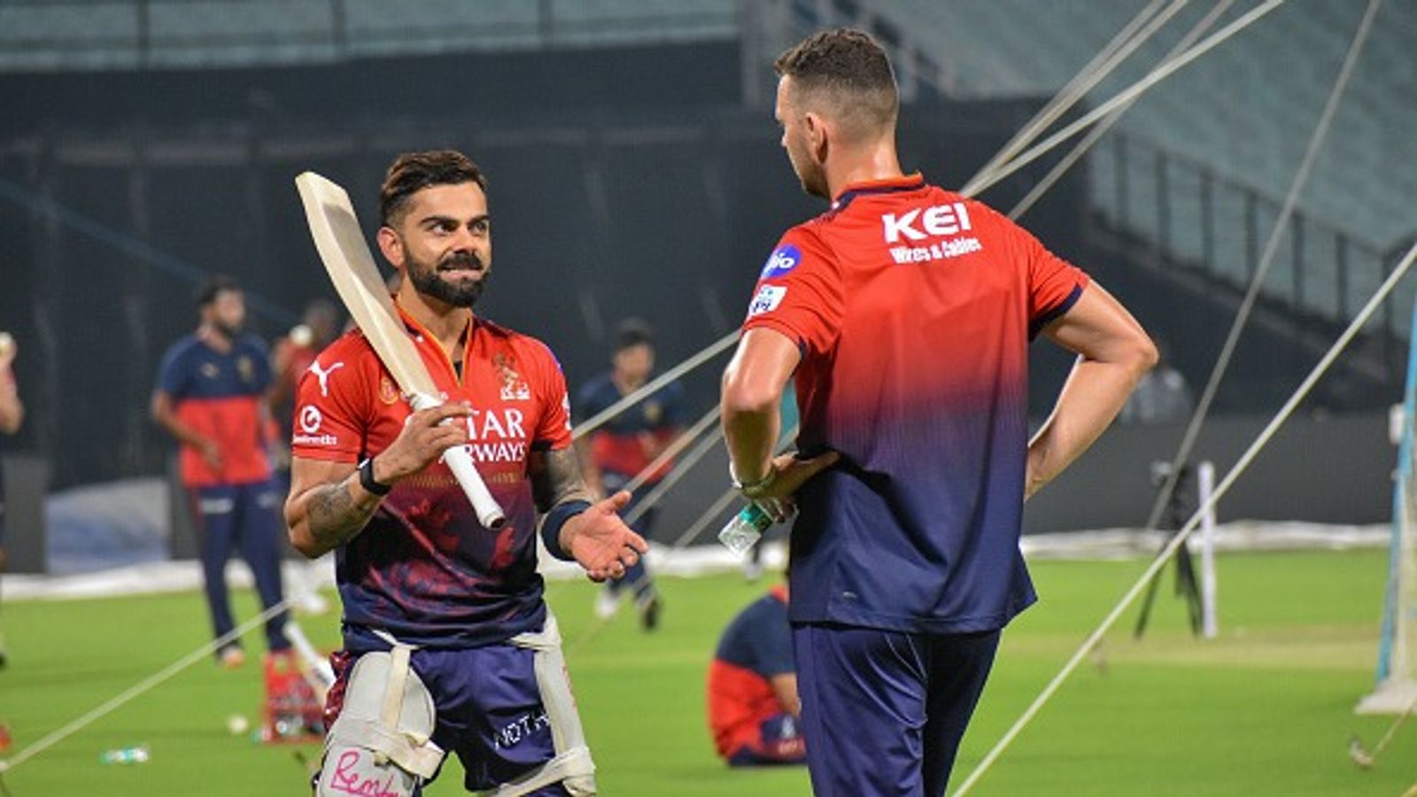 'Australia fully respects Virat for what he has done...': Josh Hazlewood lauds Kohli ahead of CSK vs RCB IPL 2025 clash, Watch Video Virat Kohli and Josh Hazlewood are seen during a practice session of Royal Challengers Bangalore
