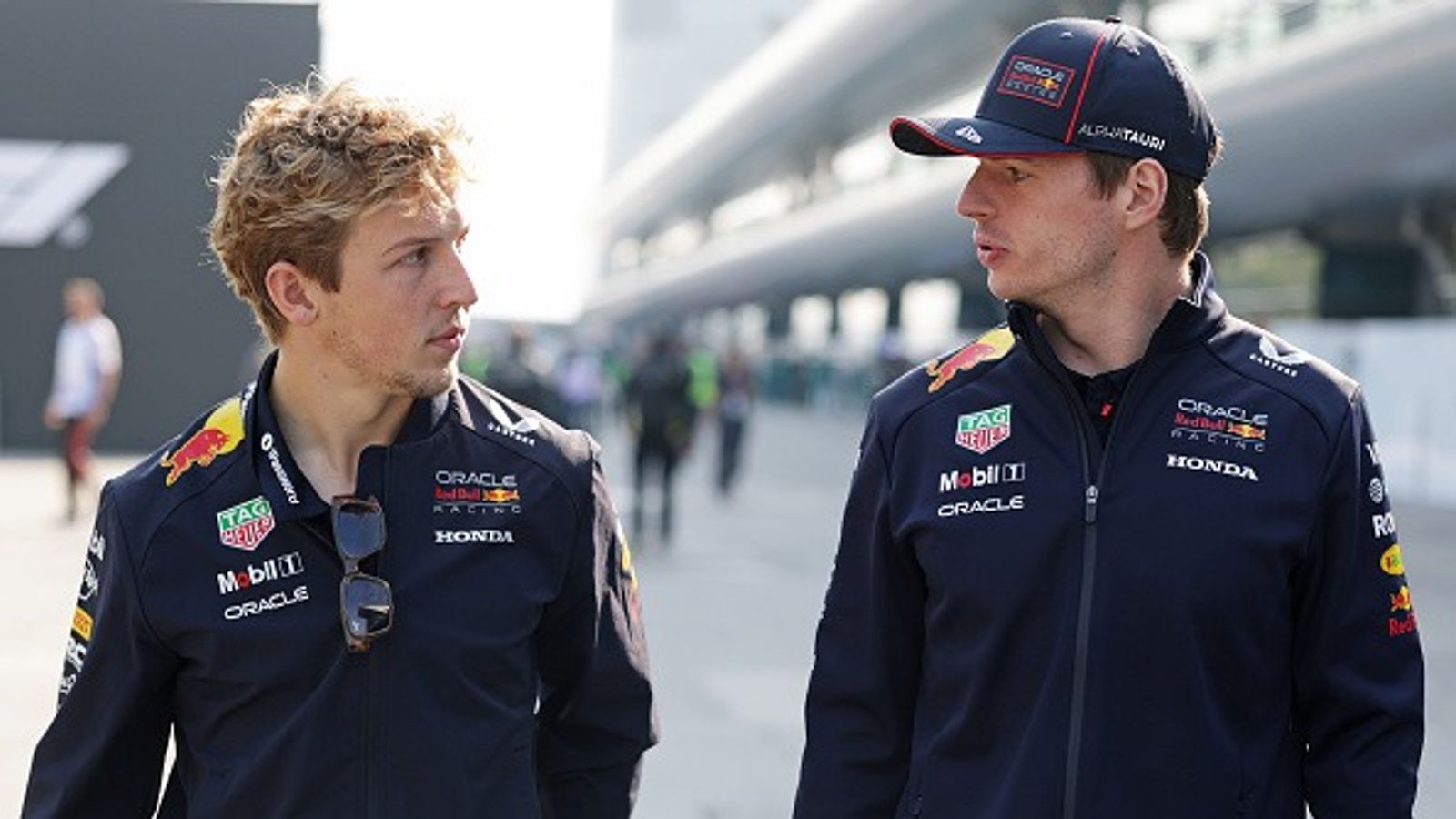 Max Verstappen Shares His Take on Red Bull's Controversial Decision to Dismiss Liam Lawson Liam Lawson of New Zealand and Oracle Red Bull Racing and Max Verstappen of the Netherlands and Oracle Red Bull Racing walk and talk