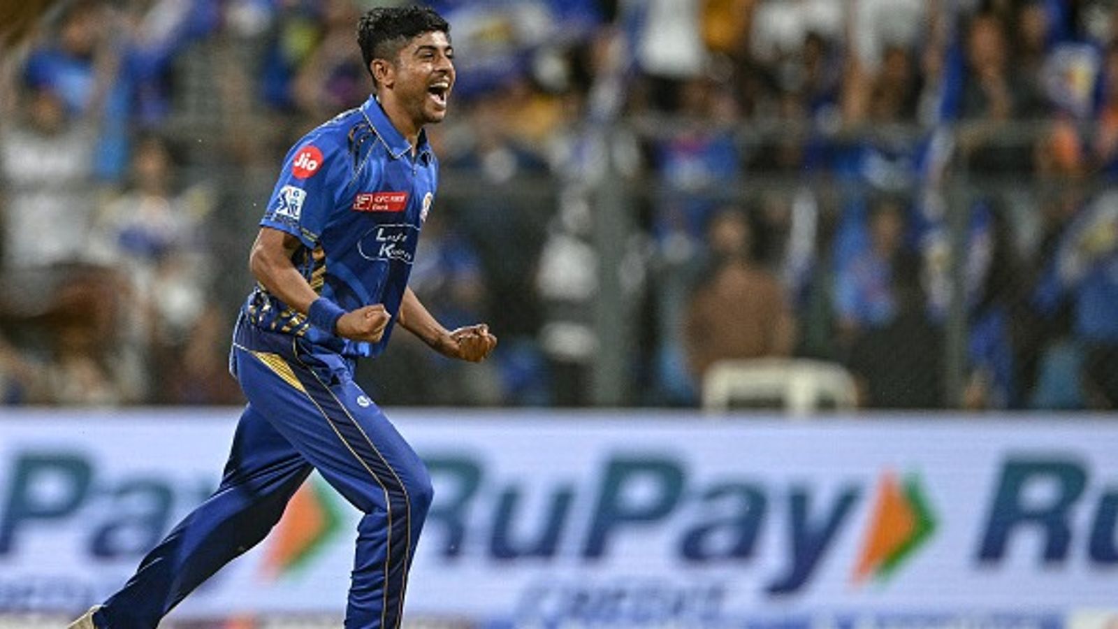 Who is 23-yr-old MI star Ashwani Kumar, who scripted history by breaking KKR's back with memorable four-fer on IPL debut? Mumbai Indians' star bowler Ashwani Kumar in this frame
