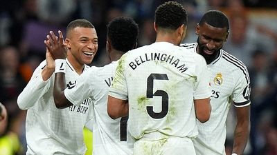 Real Madrid vs Valencia Live Streaming: How to watch the La Liga match in India, USA, UK, Spain, Saudi Arabia, and Australia? Kylian Mbappe of Real Madrid celebrates scoring his team's third goal with Vinicius Junior, Jude Bellingham and Antonio Ruediger