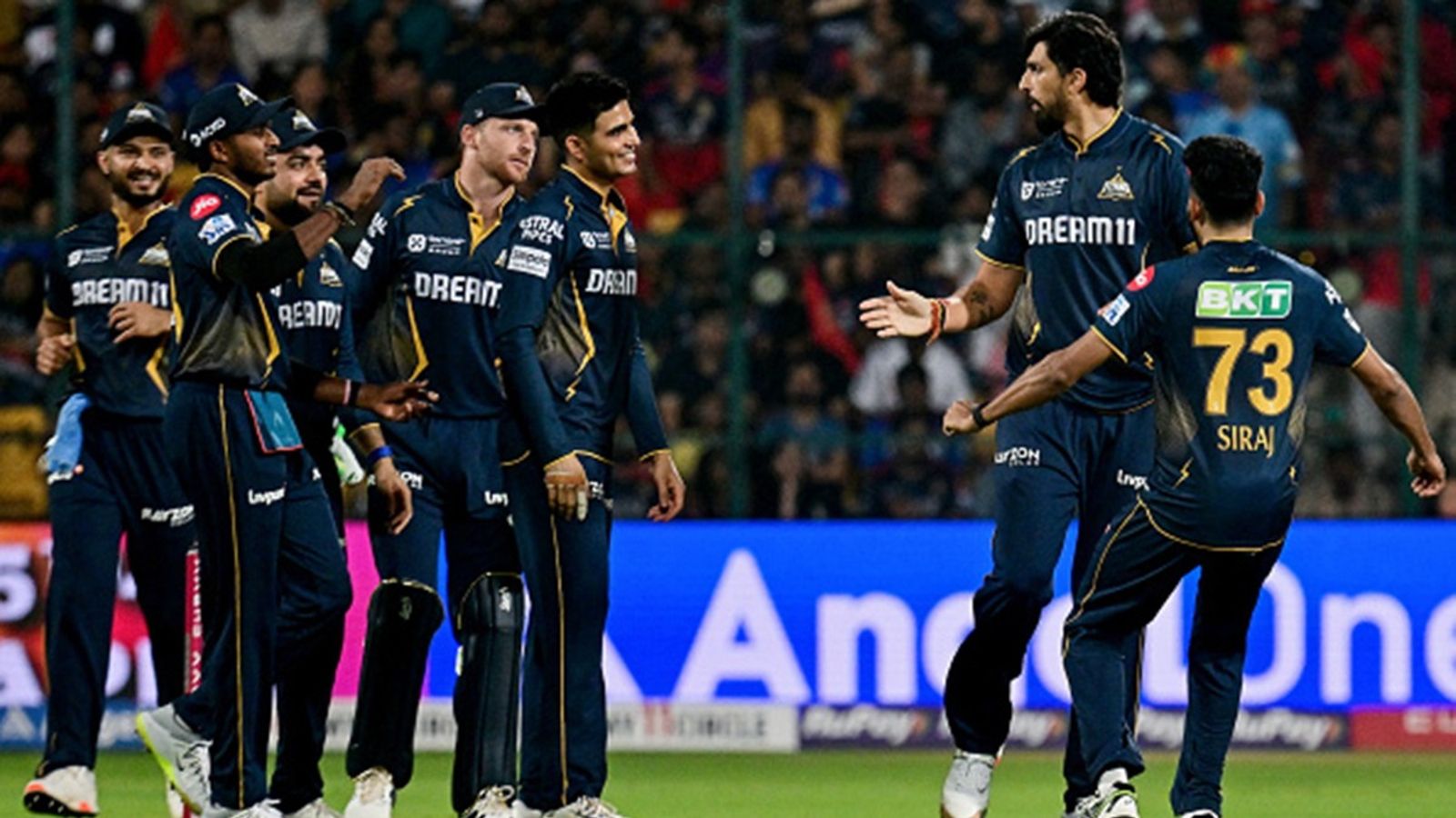 Gujarat Titans pacer Ishant Sharma slapped with 25 percent match fee fine for unspecified incident vs SRH Gujarat Titans' Ishant Sharma (2R) celebrates with teammates after taking the wicket of Royal Challengers Bengaluru's captain Rajat Patidar during the Indian Premier League (IPL) match at the M Chinnaswamy Stadium in Bengaluru on April 2, 2025.