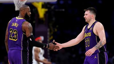 NBA Trade Rumor: LA Lakers Predicted to Pursue Bucks' Superstar MVP to Form Game-Changing Attack with Luka Doncic and LeBron James LeBron James #23 and Luka Doncic #77 of the Los Angeles Lakers shake hands