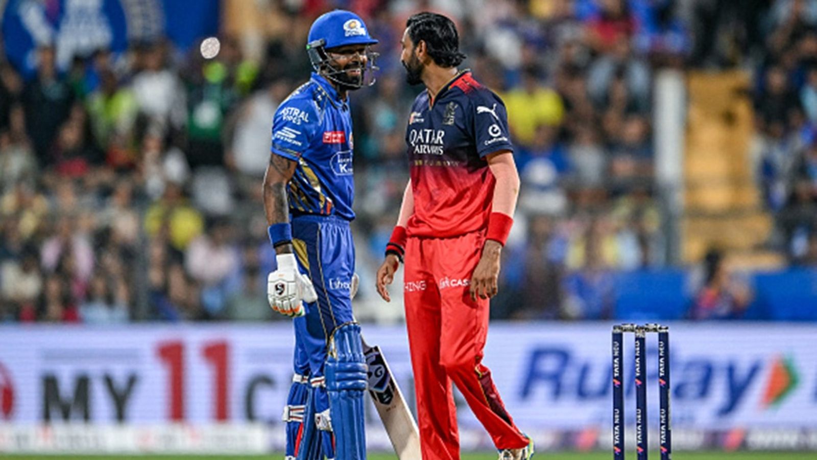 IPL 2025 Purple Cap Standings: Hardik tied with CSK spinner, Hazlewood & Krunal enter top 10 Mumbai Indians' captain Hardik Pandya (L) speaks with his brother and Royal Challengers Bengaluru's player Krunal Pandya during the Indian Premier League (IPL) match at the Wankhede Stadium in Mumbai on April 7, 2025.