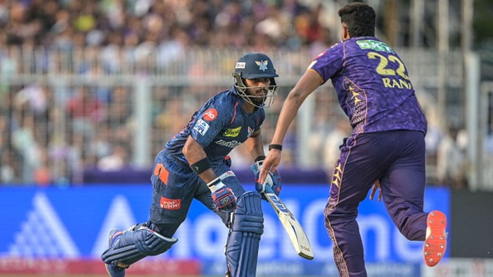 IPL 2025: Pooran-Marsh's lightning fifties guide LSG to thrilling 4-run win over KKR, Rinku's blitz in vain Lucknow Super Giants' Nicholas Pooran (L) runs between the wickets as Kolkata Knight Riders' Harshit Rana runs to field in this frame