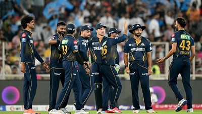 IPL 2025: Sudharsan's 82, Prasidh's 3-fer set up GT's thumping 58-run win over RR, record 4th straight victory GT's Prasidh Krishna (R) celebrates with his teammates during IPL 2025 clash against RR