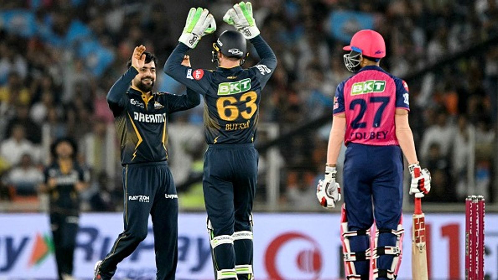 IPL 2025 updated points table: GT dislodge DC from top after 4th straight win; RR left lurching post 58-run loss Gujarat Titans' Rashid Khan (L) celebrates with wicketkeeper Jos Buttler after taking the wicket of Rajasthan Royals' Shubham Dubey (R) in this frame