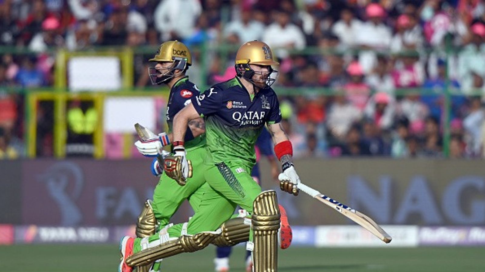 Virat Kohli, Phil Salt's fifties power Royal Challengers Bengaluru to a dominating 9-wicket win against Rajasthan Royals Phil Salt (R) and Virat Kohli of Royal Challengers Bengaluru run between the wickets during the 2025 IPL match between Rajasthan Royals and Royal Challengers Bengaluru