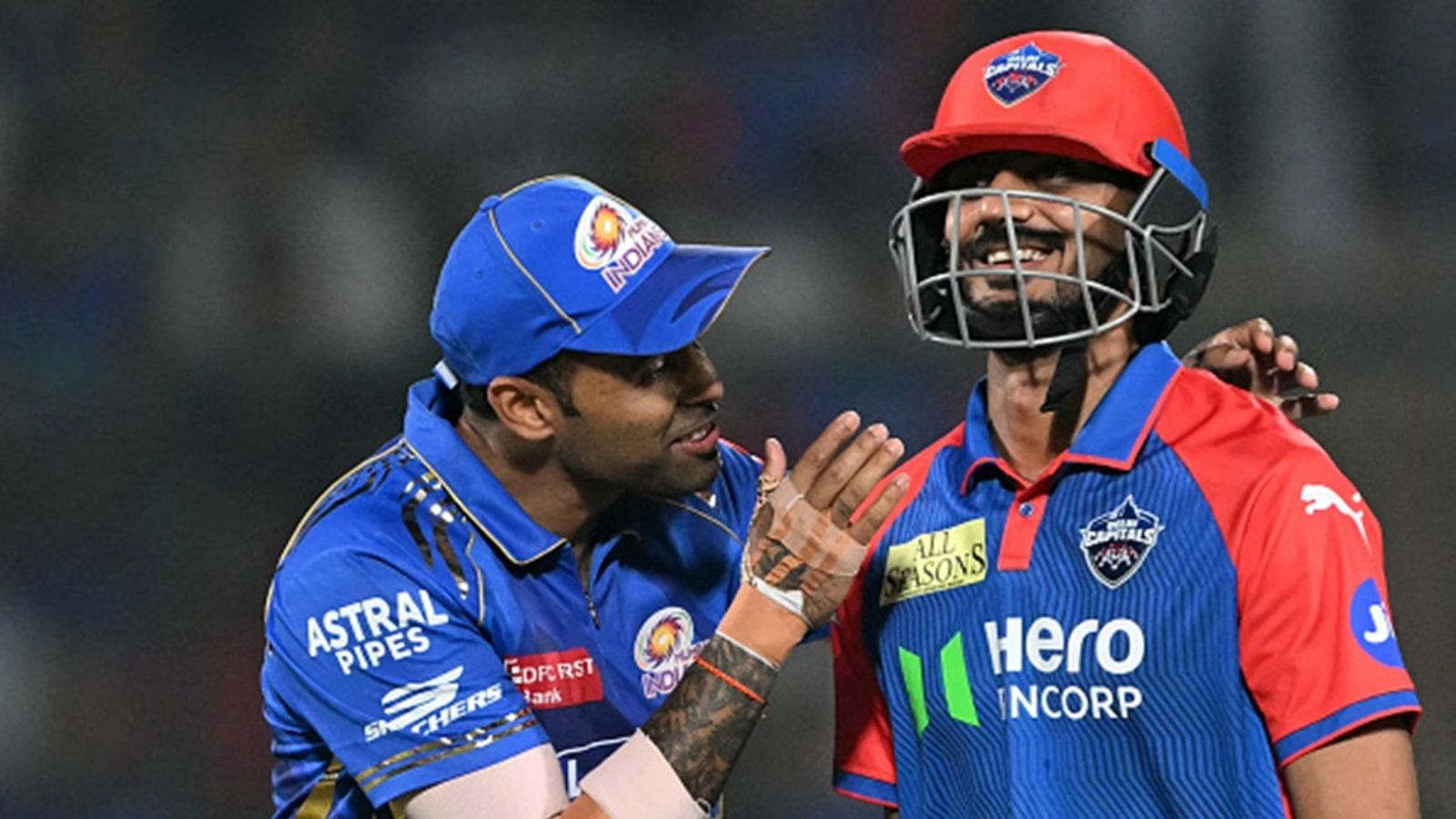 Big blow to Axar Patel after Delhi Capitals' first loss of IPL 2025, booked for this offence Mumbai Indians' Suryakumar Yadav (L) gestures to Delhi Capitals' captain Axar Patel after taking his catch during the Indian Premier League (IPL) match at the Arun Jaitley Stadium in New Delhi on April 13, 2025.