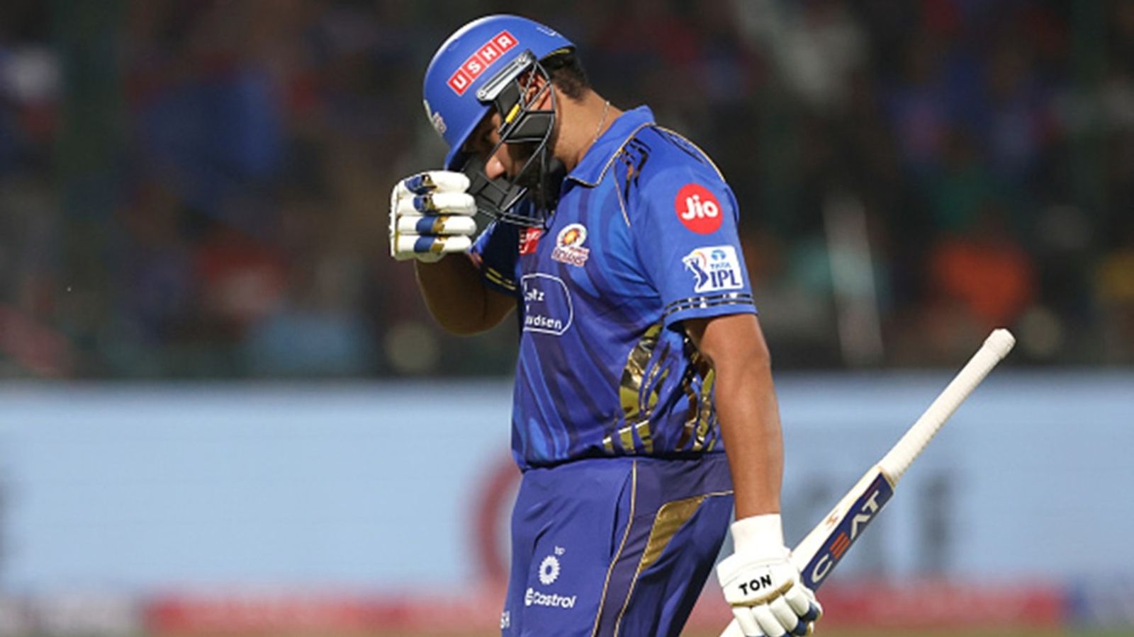 'They can always look at pushing Rohit Sharma down the order or...': Former India captain feels star opener's poor form hurting Mumbai Indians Rohit Sharma of Mumbai Indians makes their way off after being dismissed during the 2025 IPL match against Delhi Capitals at Arun Jaitley Stadium on April 13, 2025.