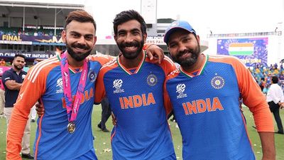 BCCI central contract: Rohit, Virat, Jasprit to continue their A+ grade as Indian Cricket Board set to announce list of players on this day Virat Kohli, Jasprit Bumrah and Rohit Sharma of India pose after India defeated South Africa to win the ICC Men's T20 Cricket World Cup West Indies & USA 2024 Final