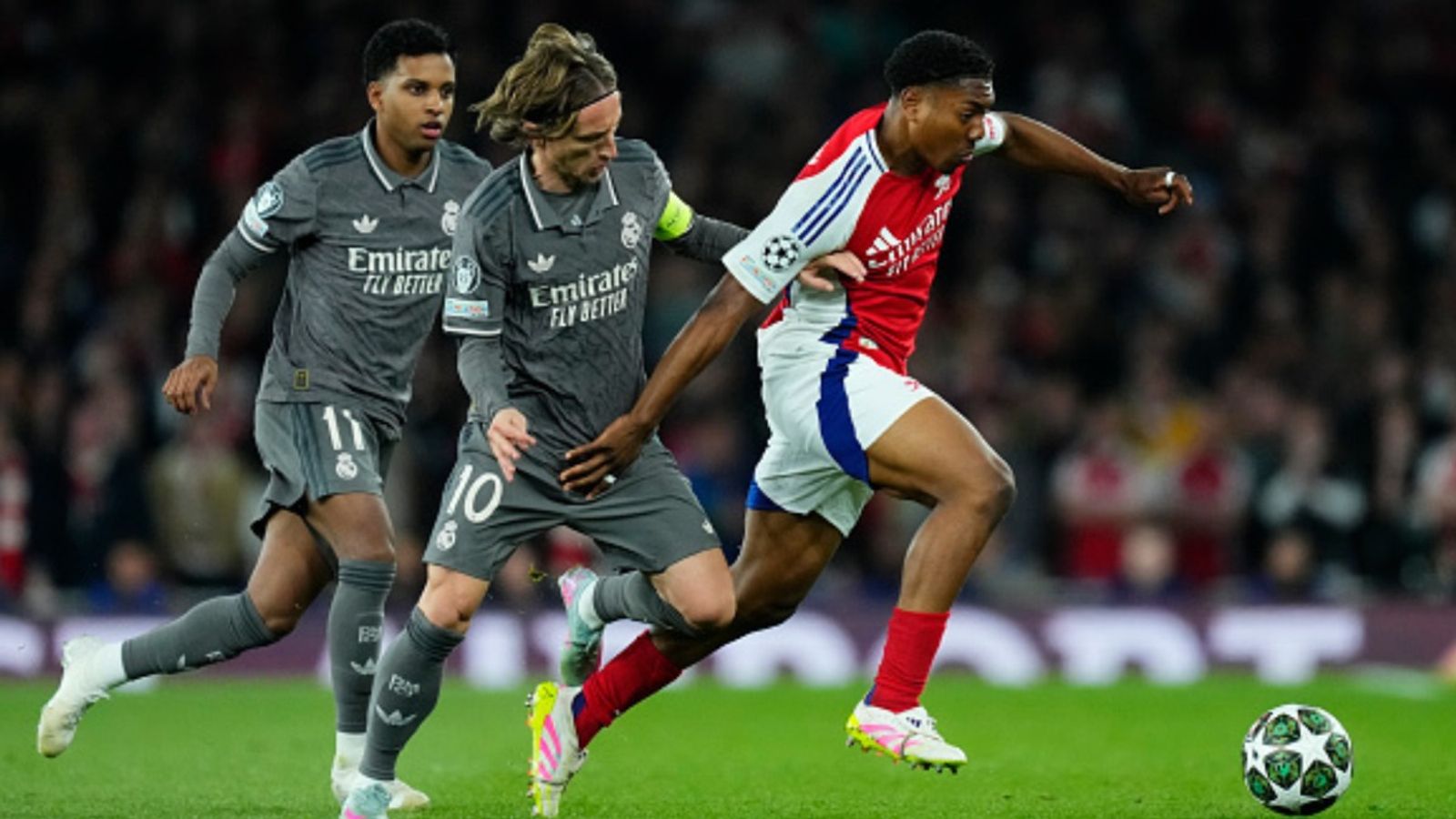 Real Madrid vs Arsenal Live Streaming: How to Watch the UEFA Champions League Quarterfinal Game in India, USA, UK, Saudi Arabia, and Australia? Myles Lewis-Skelly and Luka Modric in the frame