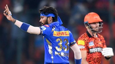 MI vs SRH predicted playing XI: Will Mumbai Indians star Jasprit Bumrah restrict Sunrisers Hyderabad's destructive batters at batting paradise Wankhede? Hardik Pandya (L) gestures after a delivery during the Indian Premier League (IPL) Twenty20 cricket match between Sunrisers Hyderabad and Mumbai Indians