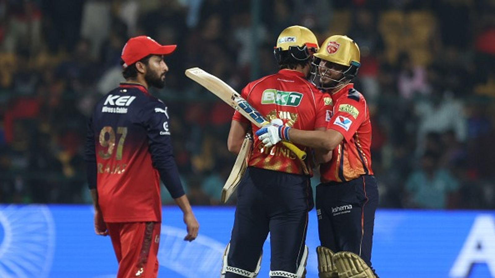 RCB vs PBKS Highlights, IPL 2025: Nehal Wadhera and bowlers steer PBKS to comfortable 5-wicket win over RCB in rain-shortened match PBKS' Nehal Wadhera and Marcus Stoinis celebrate after beating RCB in their IPL 2025 clash