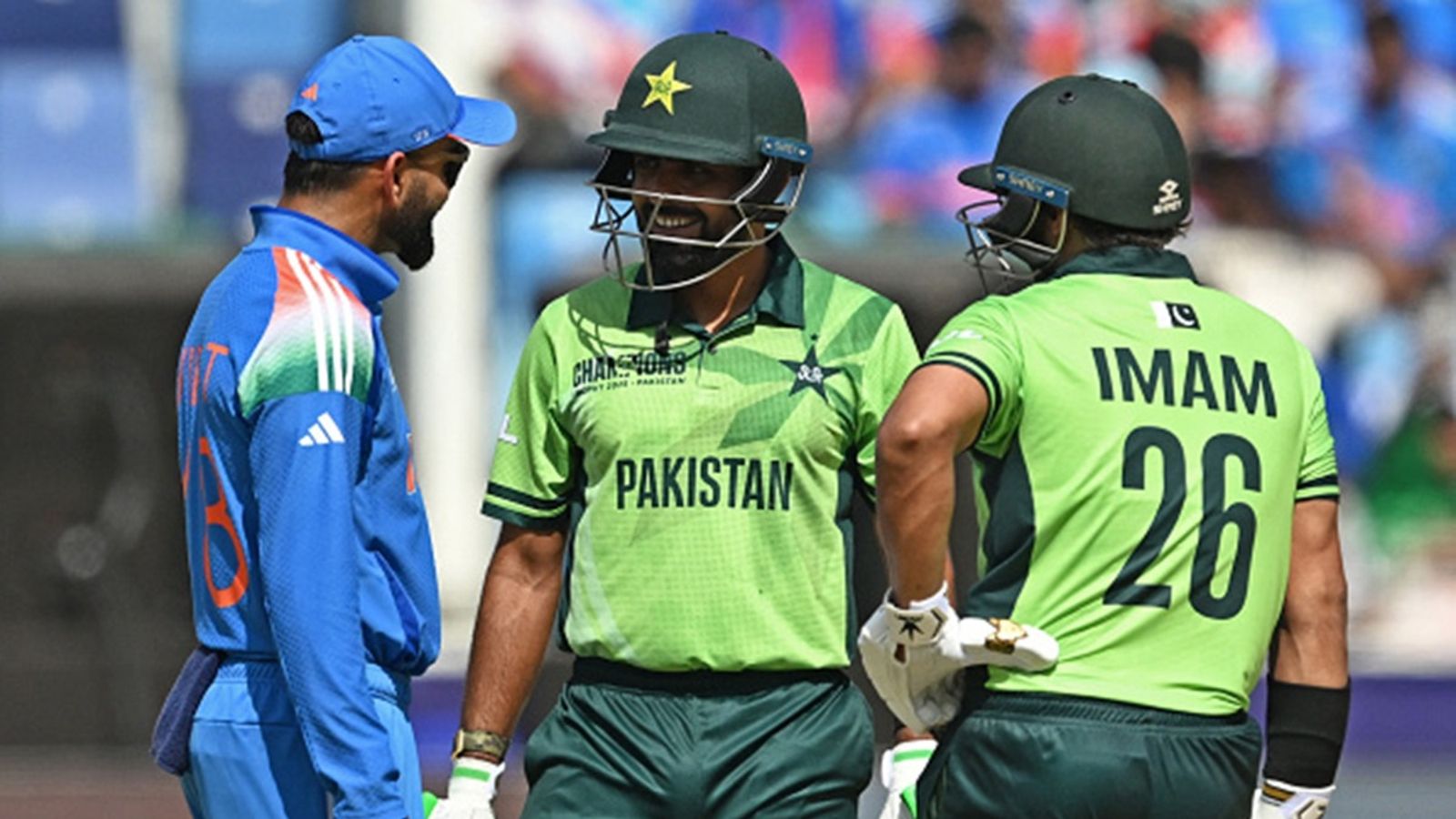 'Babar Azam will be a bigger player than anyone in the world, including Virat Kohli': PSL team's owner makes tall claim about ex-PAK captain's comeback Pakistan's Babar Azam (C) speaks with India's Virat Kohli (L) as Pakistan's Imam-ul-Haq watches during the ICC Champions Trophy ODI match at the Dubai International Stadium in Dubai on February 23, 2025.