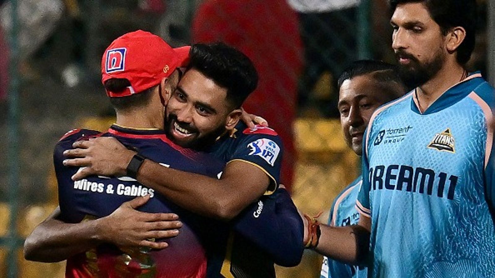 'Virat Kohli bhaiya gave me...': Mohammed Siraj reveals how RCB superstar supported him in tough phase after Champions Trophy snub GT's Mohammed Siraj (2L) is congratulated by RCB's Virat Kohli (L) for his team's win at the end of their IPL 2025 clash