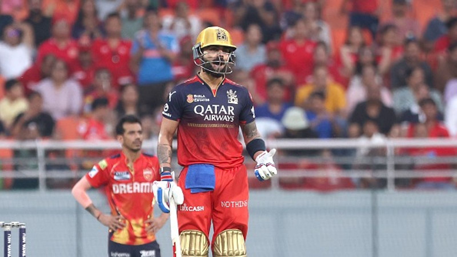 'I'm too small to talk about Virat Kohli, his body language...': RCB legend's big words for batting superstar amidst stellar show in IPL 2025 RCB's Virat Kohli (foreground) and PBKS Yujvendra Chahal (background) in this frame