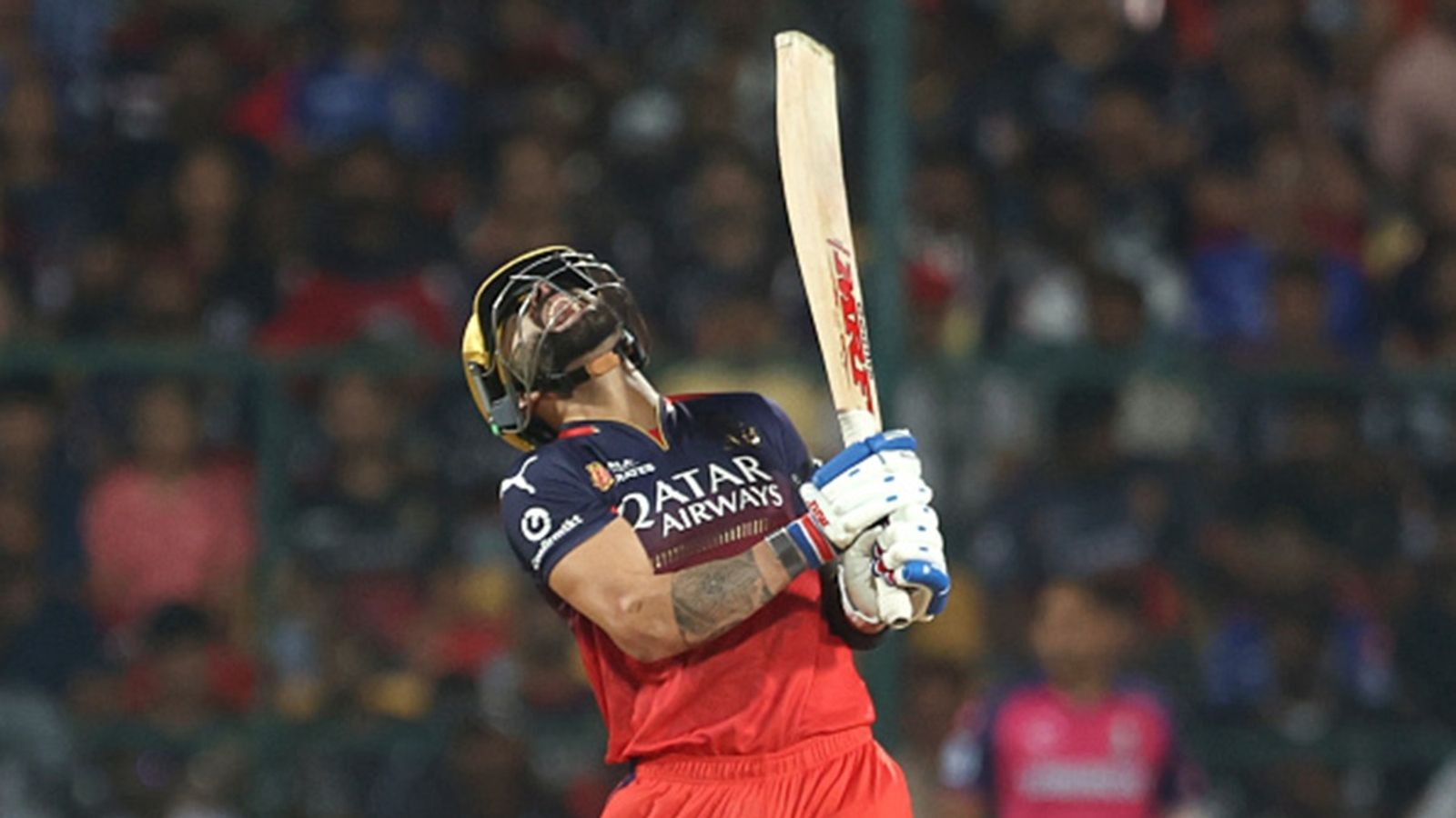 'It wasn't only Virat last season who wasn't batting at desired strike rate': RCB assistant coach labels Kohli has genius ahead of DC clash Virat Kohli of Royal Challengers Bengaluru reacts during the 2025 IPL match against Rajasthan Royals at M Chinnaswamy Stadium on April 24, 2025, in Bengaluru, India.