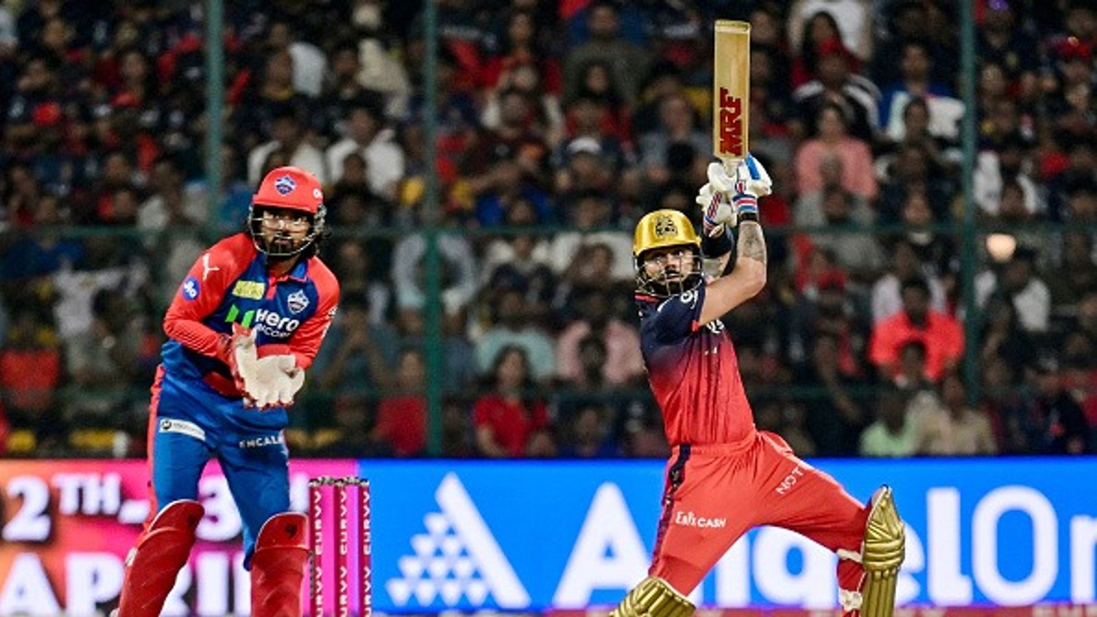 'Pavilion in which you're sitting, it's mine': Ex-India coach predicts Virat Kohli's response to KL Rahul's celebration ahead of DC vs RCB IPL 2025 clash Royal Challengers Bengaluru's Virat Kohli (R) plays a shot as Delhi Capitals' wicketkeeper KL Rahul watches during the Indian Premier League (IPL)