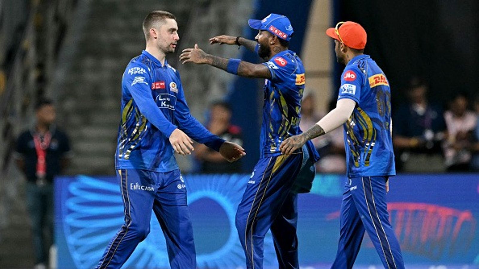 'We did it for them...': Hardik Pandya dedicates Mumbai Indians' empathetic win against LSG to kids from diverse NGOs at Wankhede Mumbai Indians' Will Jacks (L), captain Hardik Pandya (C) and Suryakumar Yadav celebrate their team's win against Lucknow Super Giants at the end of their Indian Premier League (IPL)