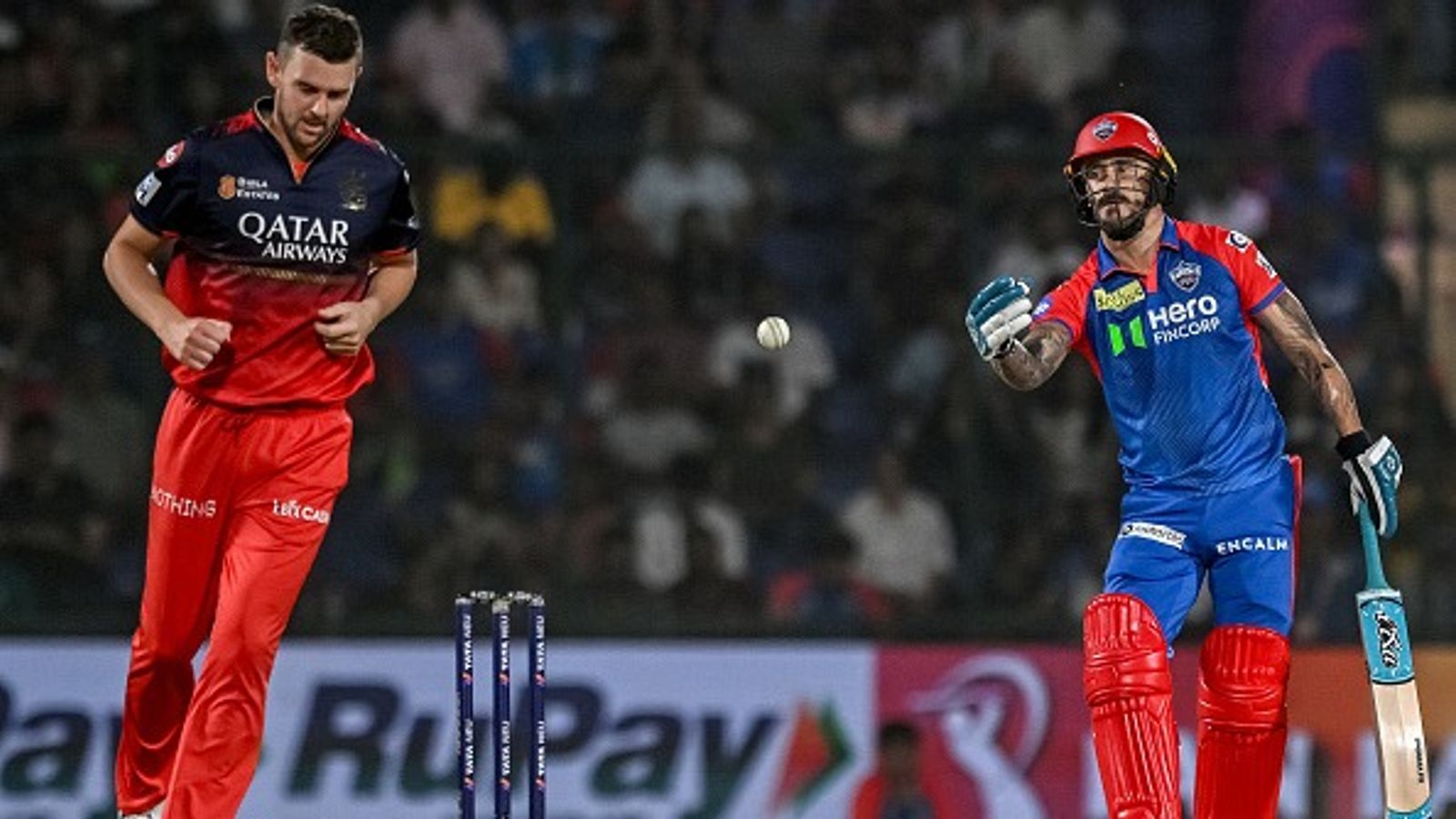 IPL 2025 Updated Points Table: RCB rocket to top of the table; know where DC are placed after 54-run defeat against Bengaluru Delhi Capitals' Faf du Plessis (R) throws the ball as Royal Challengers Bengaluru's Josh Hazlewood walks back in this frame