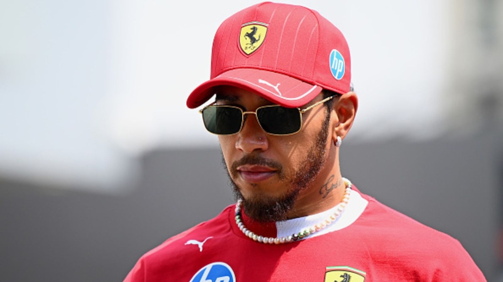 Lewis Hamilton reacts as retirement rumors heat up once again amid a shaky 2025 season Lewis Hamilton in the frame (via Getty)