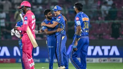 IPL 2025 Updated points table after RR vs MI match: Mumbai Indians become table toppers after 100-run win against Rajasthan Royals Jasprit Bumrah (2L) and his teammate Trent Boult (2R) celebrate their team's win in the Indian Premier League (IPL) Twenty20 cricket match between Rajasthan Royals and Mumbai Indians at the Sawai Mansingh Stadium