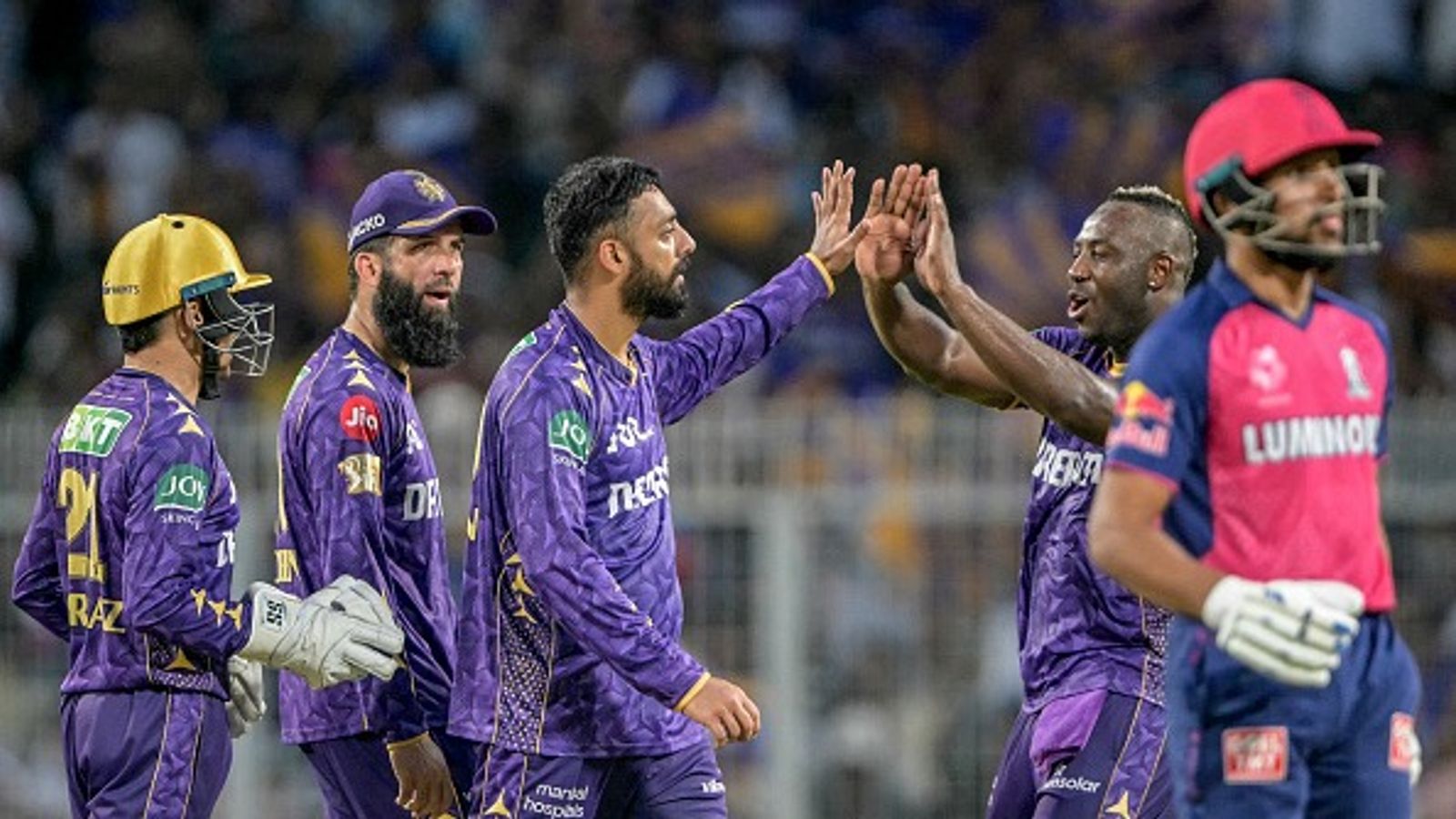 KKR vs RR IPL 2025 Highlights: KKR stay afloat in playoff race with thrilling 1-run win over RR despite Riyan Parag's lightning 45-ball 95 Kolkata Knight Riders' Varun Chakravarthy (C) celebrates with teammates after taking the wicket of Rajasthan Royals' Dhruv Jurel in this frame