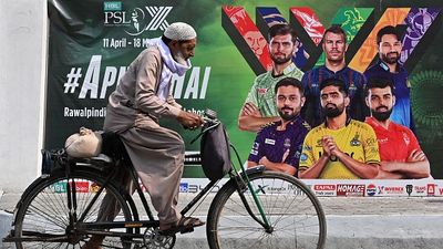 PCB postpones PSL 2025 after Dubai shut doors on Pakistan's plan to host remainder of tournament in UAE A cyclist rides past a hoarding outside the Gaddafi Cricket Stadium, one of the venues for the Pakistan Super League (PSL), in Lahore on May 9, 2025. Pakistan's T20 cricket league