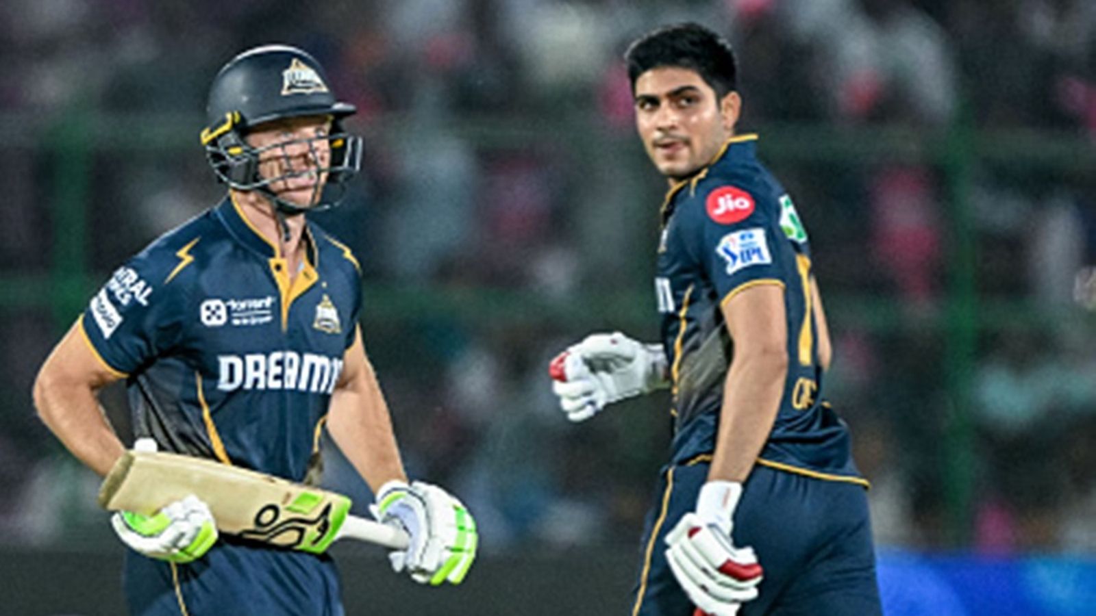 England Cricket Board offers to host remainder of IPL 2025 as several players fly back home amidst rising India-Pakistan border tensions Gujarat Titans' Jos Buttler (L) and his captain Shubman Gill run between the wickets during the Indian Premier League (IPL) match against Rajasthan Royals at the Sawai Mansingh Stadium in Jaipur on April 28, 2025.