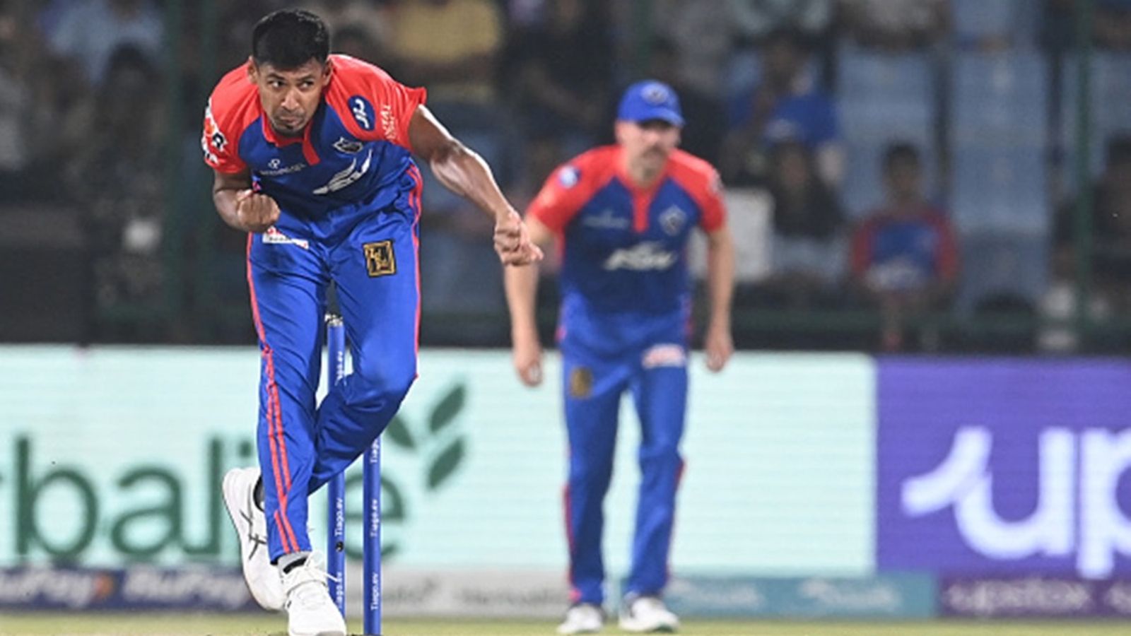 Delhi Capitals' replacement player Mustafizur Rahman heads to UAE for T20I series, set to miss GT clash even if he gets NOC from BCB Delhi Capitals' Mustafizur Rahman bowls during the Indian Premier League (IPL) match against Mumbai Indians at the Arun Jaitley Stadium in New Delhi on April 11, 2023.