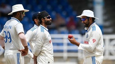 'He should be in the conversation...': Not Shubman Gill or KL Rahul, Ravichandran Ashwin suggests BCCI to appoint this veteran as new Test captain Ravindra Jadeja (2L) and Ravichandran Ashwin (L) of India inspect the ball during the third day of the second Test cricket match between India and West Indies at Queen's Park Oval in Port of Spain,