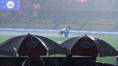 IPL 2025: What is the cut-off time for full 20-over and five-over RCB vs KKR match as persistent rain delays toss in Bengaluru The Spidercam lens is cover by an operative as toss is delayed due to rain prior to the 2025 IPL match between Royal Challengers Bengaluru and Kolkata Knight Riders at M Chinnaswamy Stadium