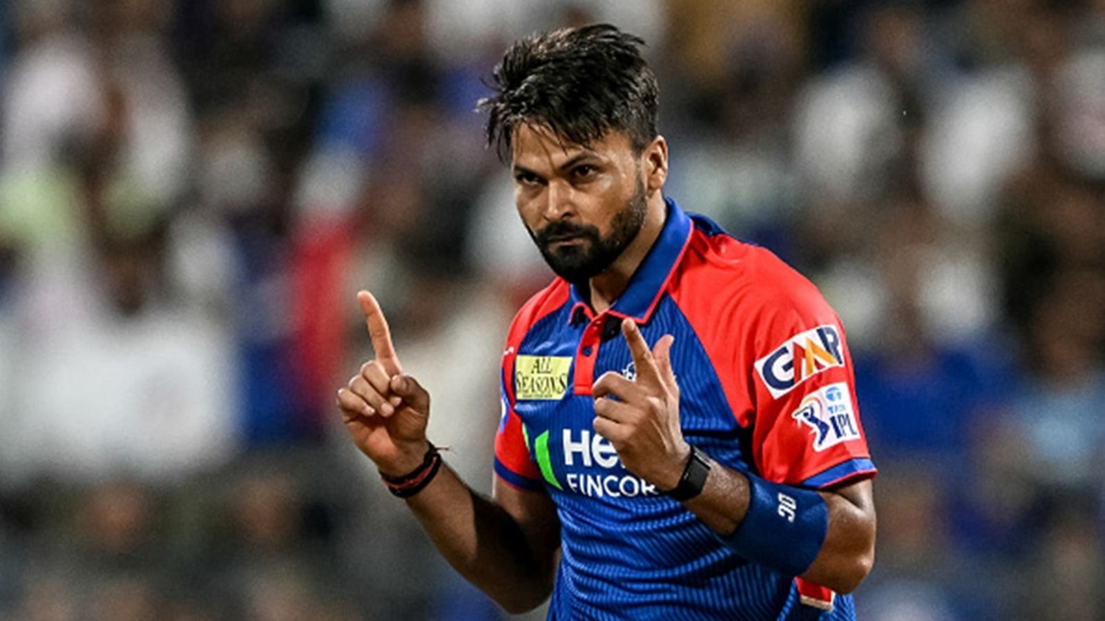 BCCI punishes Delhi Capitals' Mukesh Kumar for breaching IPL Code of Conduct during Mumbai Indians clash, pacer admits to offence Delhi Capitals' Mukesh Kumar celebrates after taking the wicket of Mumbai Indians' Will Jacks during the Indian Premier League (IPL) match at the Wankhede Stadium in Mumbai on May 21, 2025.