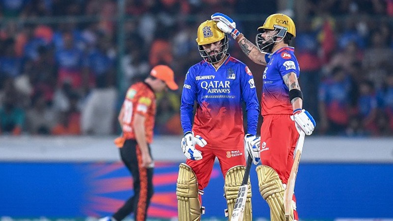 'That is a dangerous situation...': Former India cricketer's stern warning to RCB ahead of IPL 2025 clash against Sunrisers Hyderabad Royal Challengers Bengaluru's Rajat Patidar celebrates with his teammate Virat Kohli (R) after scoring a half-century (50 runs)