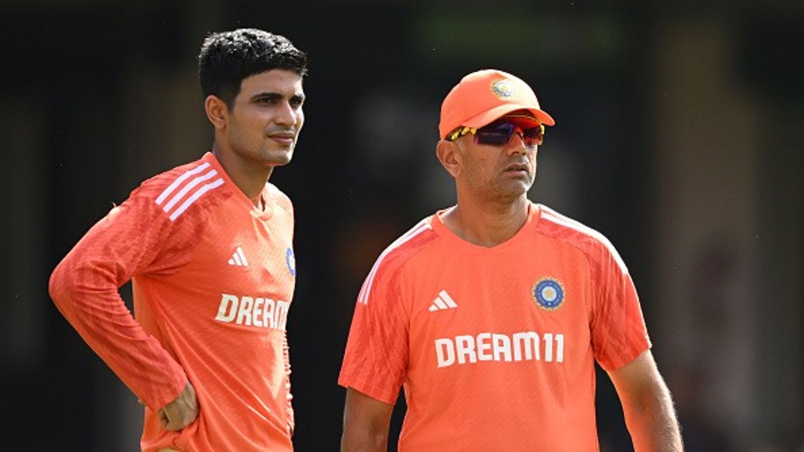 BCCI's MAJOR U-turn - Sacked coach set to travel England alongside India, Shubman Gill to miss warm-up match ahul Dravid, Coach of India speaks with Shubman Gill of India during the ICC Men's Cricket World Cup India 2023 India Net Session at M. Chinnaswamy Stadium on November 08, 2023 in Bangalore, India.