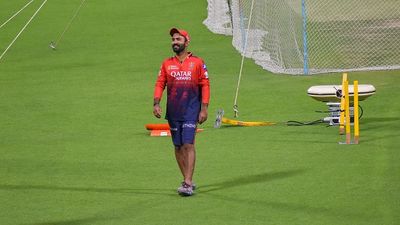 'We have bigger things to play for and...': Dinesh Karthik's stern warning for Rajat Patidar-led side after RCB's six-wicket win against LSG Team mentor Dinesh Karthik is seen during a training session of Royal Challengers Bangalore at Eden Gardens cricket ground in Kolkata, India, on March 20, 2025.
