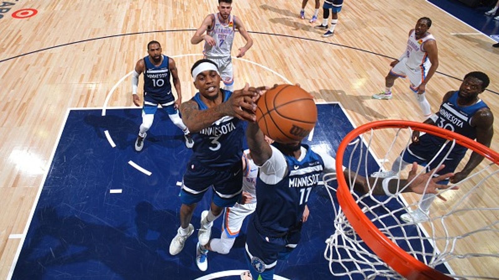 Jaden McDaniels Injury Report: Will Timberwolves' Forward Play Tonight Against the Thunder in Game 5 of the Western Conference Final? Jaden McDaniels #3 and Naz Reid #11 of the Minnesota Timberwolves goes up for the rebound