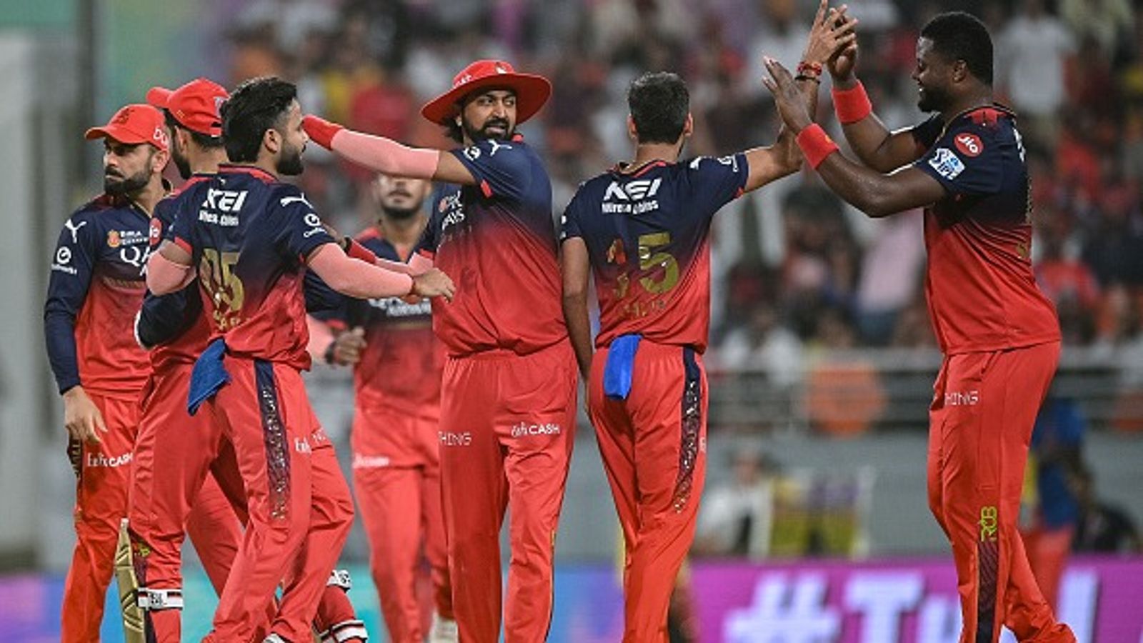 'If RCB win IPL 2025 title, he is going to be unbearable': Nasser Hussain takes sly dig at Virat Kohli's ex-teammate ahead of grand finale Royal Challengers Bengaluru's players celebrate with each other in this frame