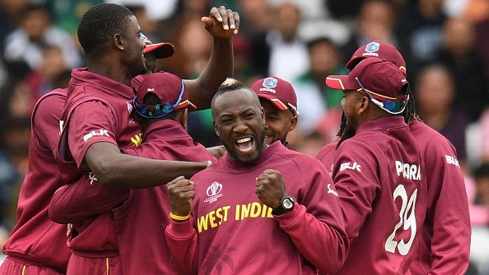 West Indies announce T20I squad for England and Ireland series, IPL's six-hitting machine opts out and Holder, Russell make comeback West Indies players including West Indies' Andre Russell (C) and Jason Holder (L) celebrate taking the wicket of Pakistan's captain Sarfaraz Ahmed during the 2019 Cricket World Cup group stage match at Trent Bridge in Nottingham, on May 31.
