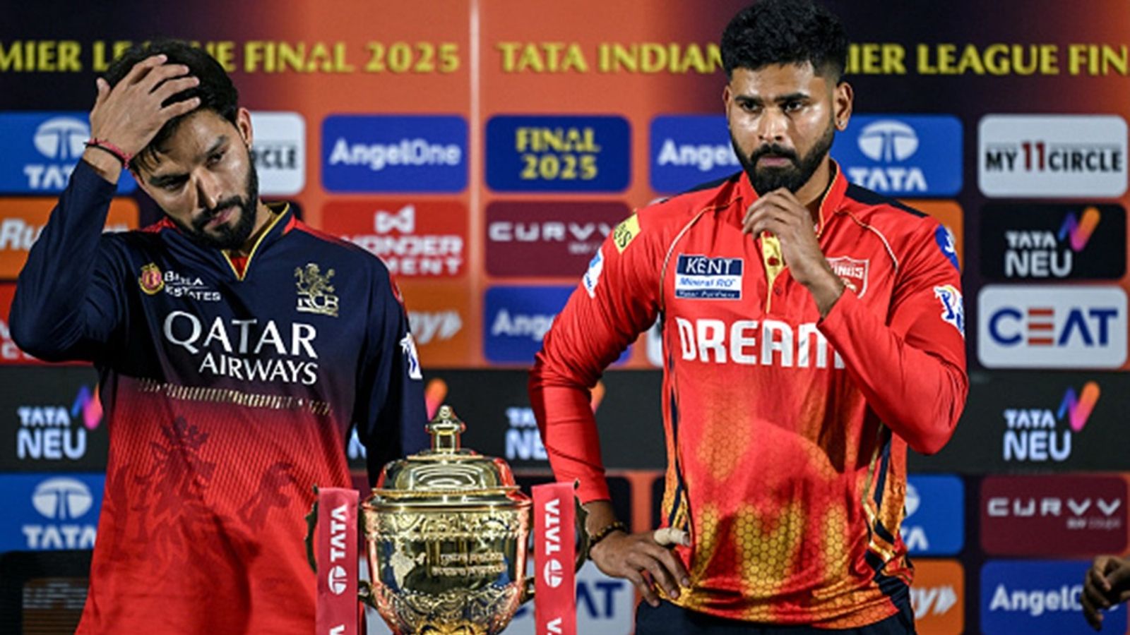 RCB vs PBKS IPL 2025 Final Predicted Playing XI: Two match-winners doubtful due to injuries, Patidar may take brave call by including this overseas player Punjab Kings' captain Shreyas Iyer (R) and his Royal Challengers Bengaluru's counterpart Rajat Patidar pose for a photograph with the IPL trophy during a press conference at the Narendra Modi Stadium in Ahmedabad on June 2, 2025.