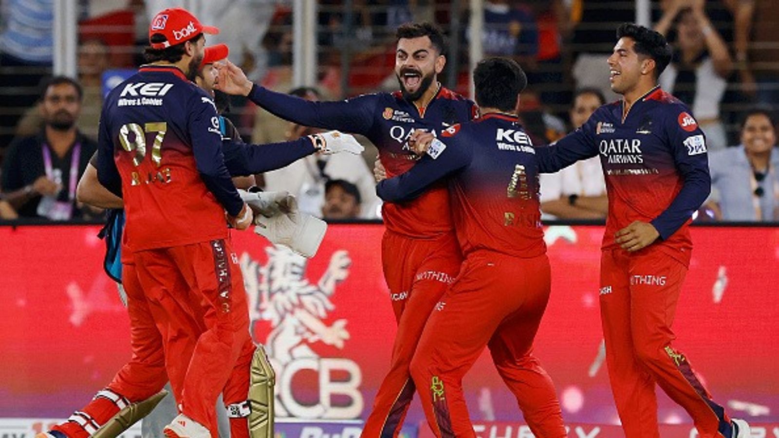 The Tears of a King Fill the Cup of Dreams - RCB, Kohli Claim Historic IPL Crown Virat Kohli of Royal Challengers Bengaluru. celebrates winning with teammates after the 2025 IPL Final match.