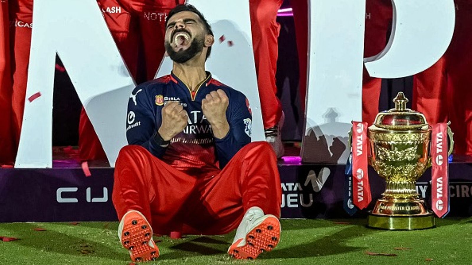 'I took a lot of stress, bohot logo ne bohot troll kiya': Virat Kohli opens up on mental struggles after winning IPL 2025 title for RCB Royal Challengers Bengaluru's Virat Kohli reacts while sitting beside the IPL 2025 trophy
