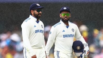 'Rohit bhai Garden mein ghum rahe hain...': Rishabh Pant's hilarious response on former India captain's absence for England series goes viral, Watch VIDEO Rohit Sharma and Rishabh Pant of India walk off the field as rain falls during day three of the Third Test match in the series between Australia and India