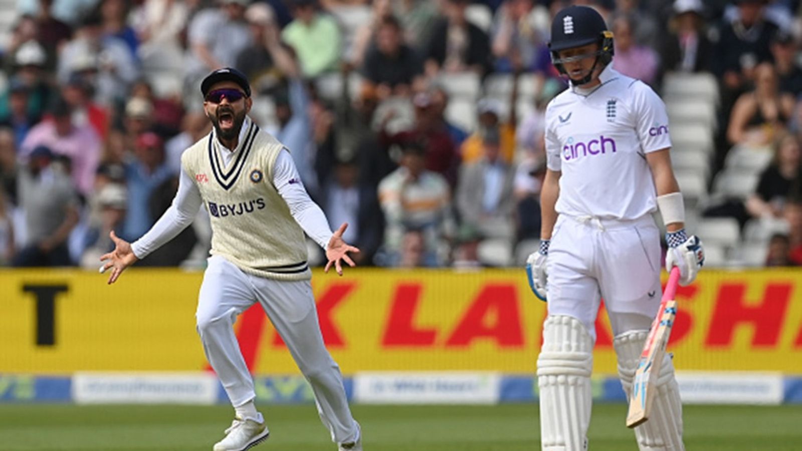 'They will miss the aura of Virat Kohli standing at slips and...': Ollie Pope's message to young Indian Test team ahead of series Virat Kohli of India celebrates after the dismissal of Ollie Pope of England during the fourth day of the fifth Test at Edgbaston on July 04, 2022 in Birmingham, England.