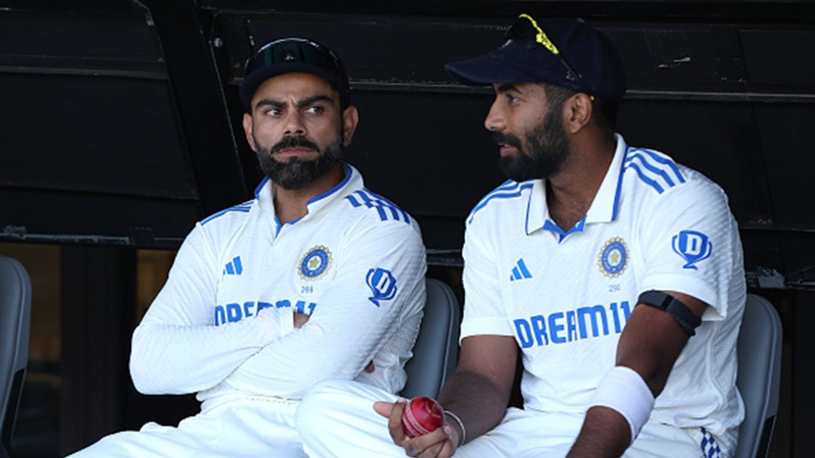 'You have a family to take care of and earn money... you can't judge fast bowlers': Jasprit Bumrah reacts to Virat Kohli's IPL 5 levels below Test cricket remark Virat Kohli and Jasprit Bumrah of India wait to walk out to field following the lunch break during day four of the first Test match in the series against Australia Perth Stadium on November 25, 2024 in Perth, Australia.