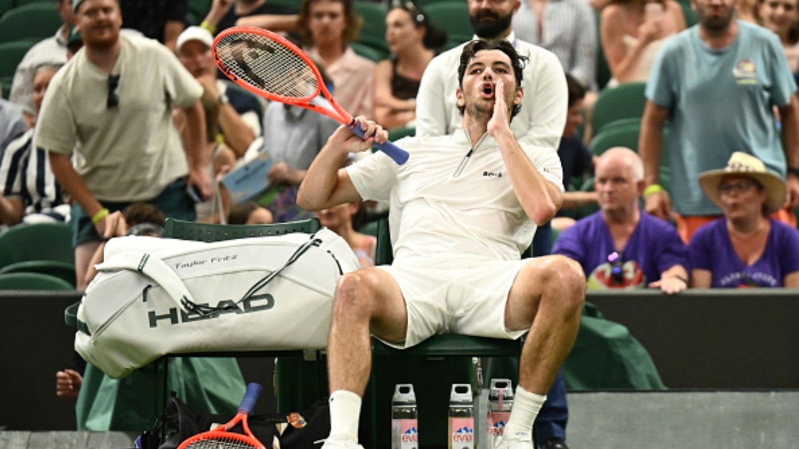 Boos echo at Wimbledon Open as Taylor Fritz clash abruptly halted mid-match Taylor Fritz reacts after his Wimbledon game was suspended (Image via Getty)